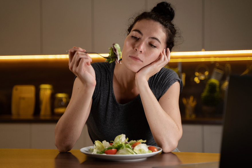 Best peptides for weight loss: a woman not eating her food.