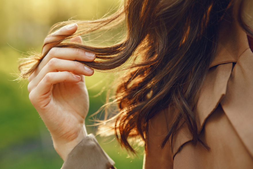 Collagen peptides benefits: healthy hair on a woman.