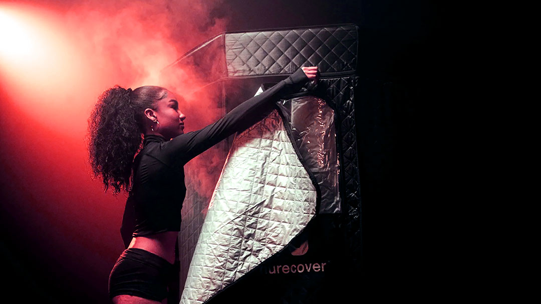 Sauna benefits: a woman using the Nurecover sauna.