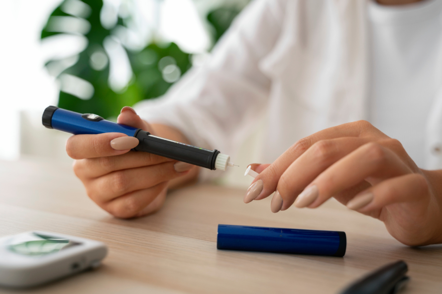 What is reta peptide: a person holding a syringe.