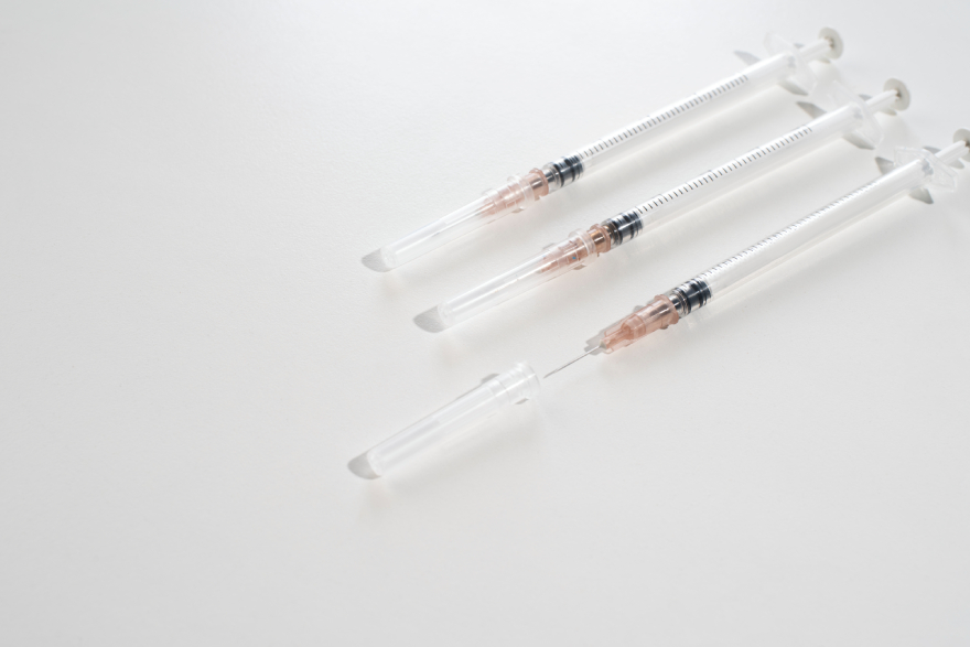 What is reta peptide: a few syringes on a table.