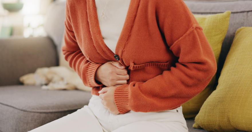 What is reta peptide: a woman holding her stomach.